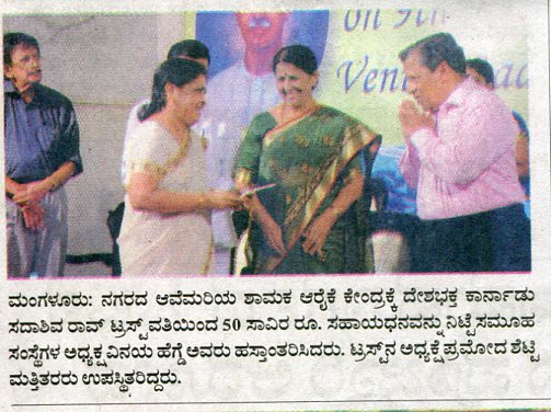 Dr Jessica receiving cheque